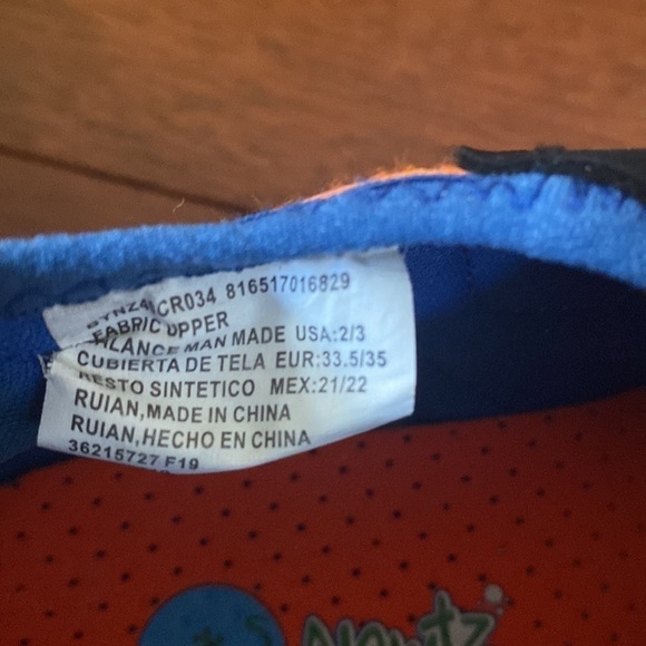 Blue, green, orange, black, and gray Newtz water shoes - Picture 7 of 8